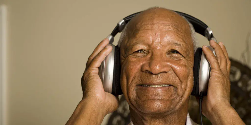 Music Therapy - Senior man with headphones
