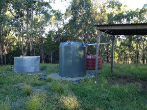 small-shipping_container_house-water_tanks-large
