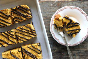 Gingerbread Pumpkin Cheesecake Squares with Chocolate Drizzle