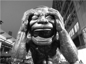 insanity_laughter_statue