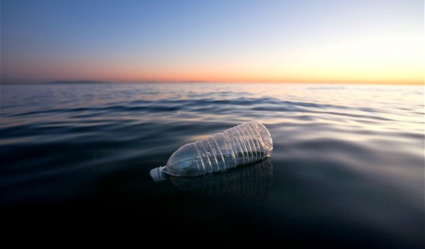 plastic water bottle in the ocean