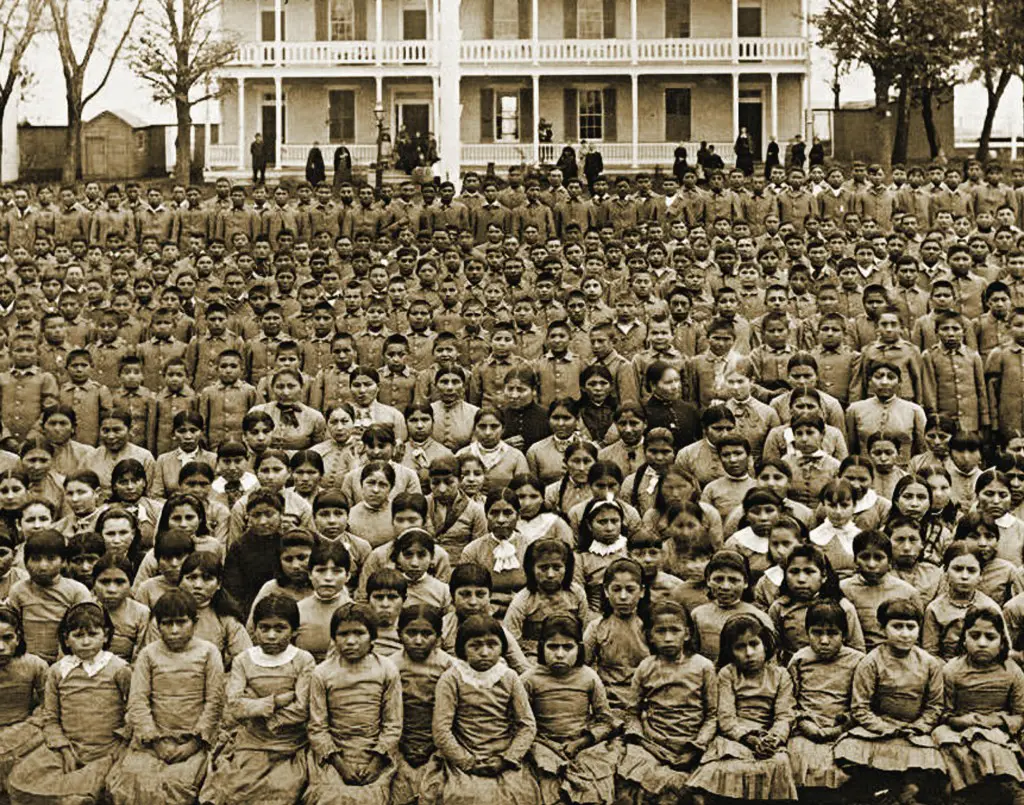 Celebrating Genocide – Christopher Columbus' Conquest of America - the government engaged in a cultural assimilation campaign, forcing thousands of Native American children into boarding schools