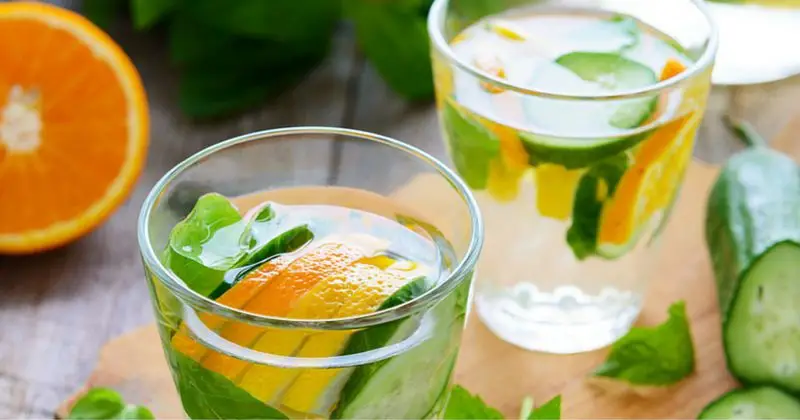 10 Detox Water Recipes to Try at Home - Orange Cucumber Rosemary and Himalayan Salt