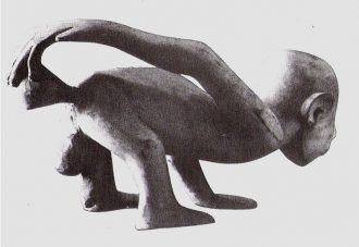 Pressure enema from an animal bladder (African wooden sculpture, 19th century), Wikipedia