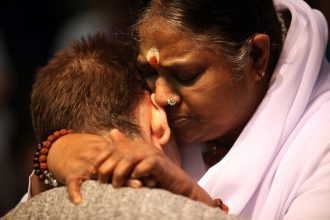 the-unseen-effects-of-embracing-someone-6-amma-hugging-saint